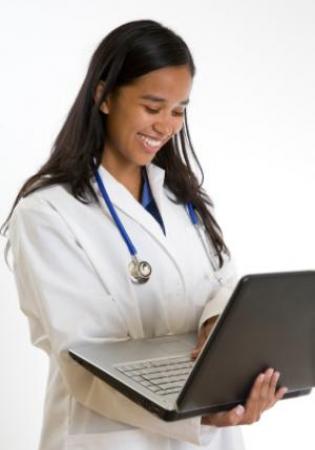 Dr. Y Veterinarian checking on patient chart